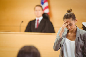 stressed attorney in the courtroom