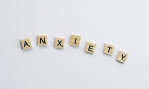 Scrabble letters that spell out anxiety